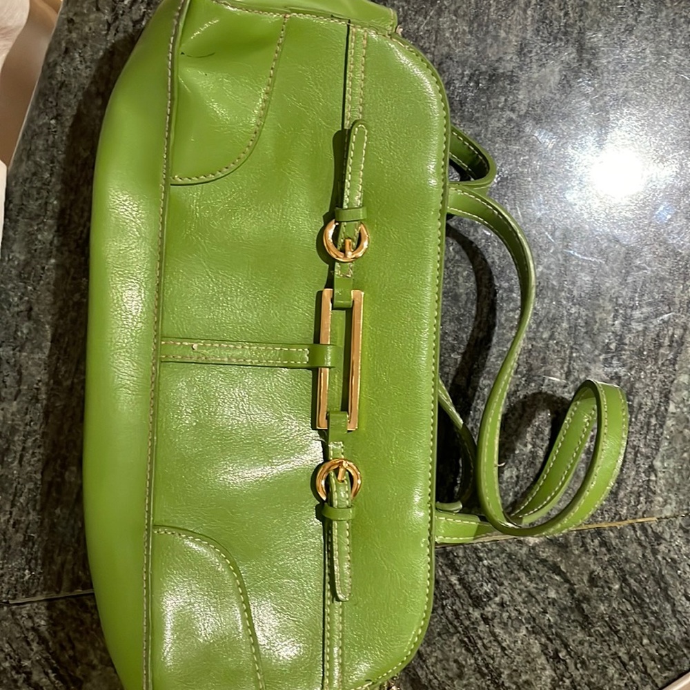 This is a beautiful green and gold mini Mcklien bag